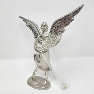 Georgia O' Keeffe Metal Angel Figurine Hugging a Bud Vase